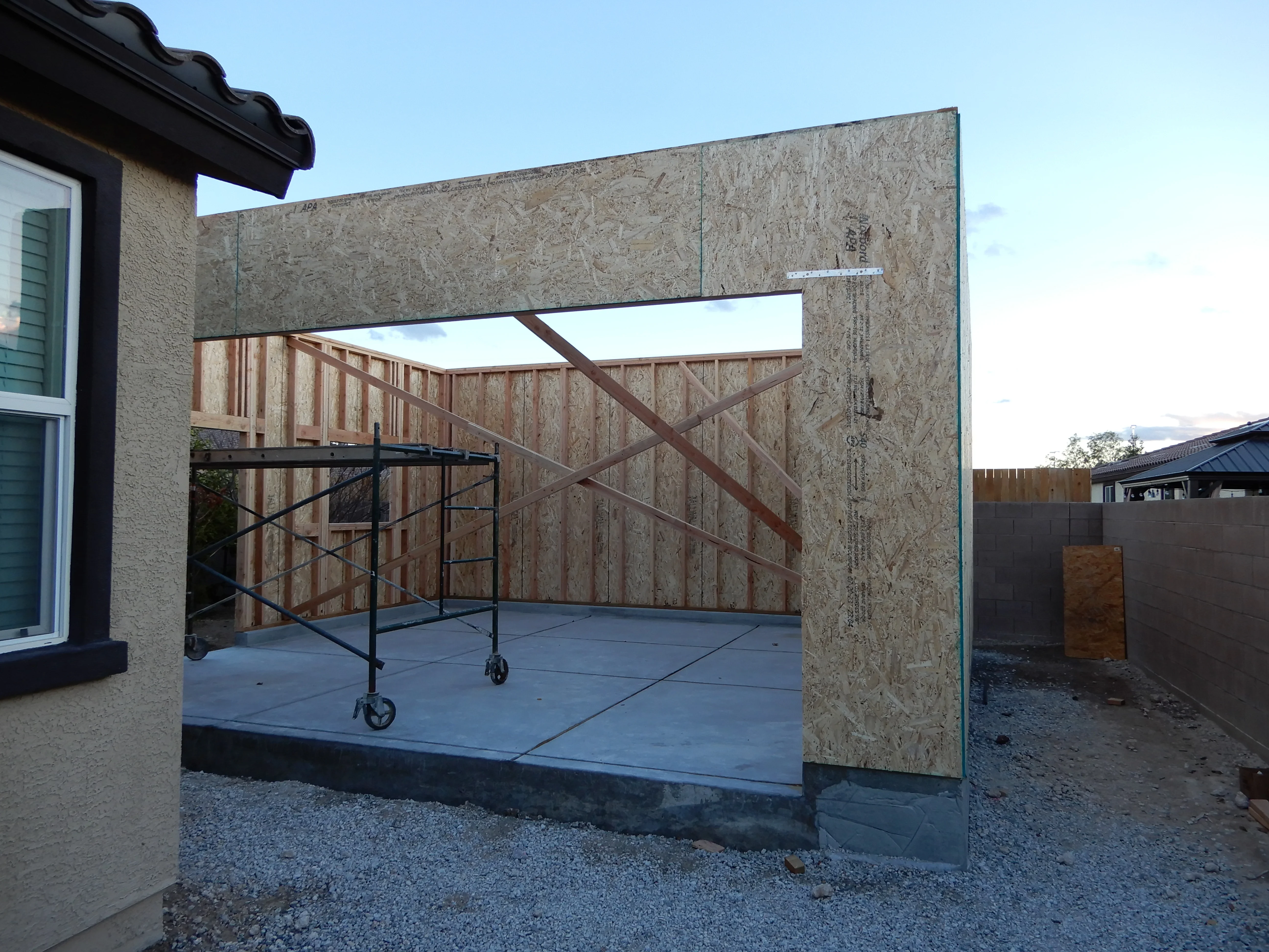 Concrete patio with pergola frame under construction in Las Vegas